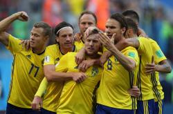 爱游戏官方入口-包含比利时队战胜瑞典，客场赢得宝贵三分的词条